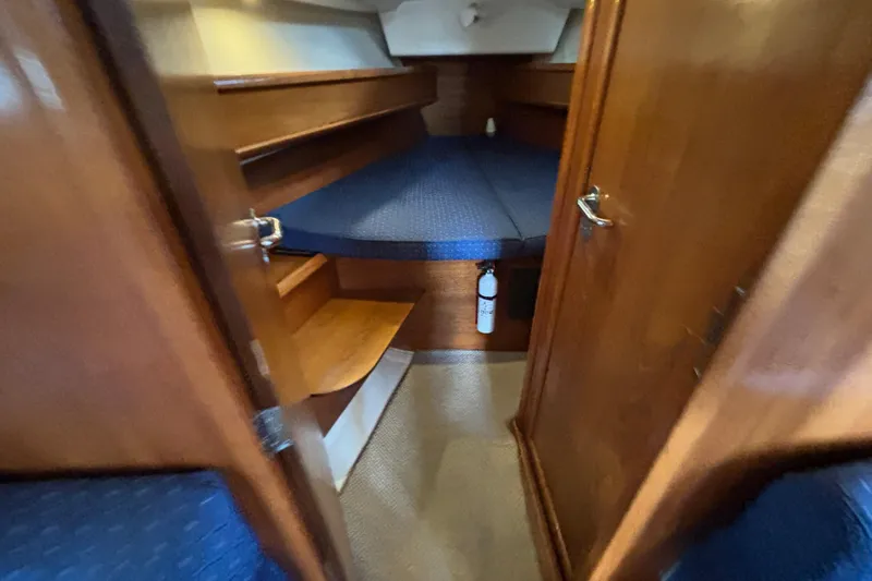 Slide: The Image of Interior cabin of 2004 Jeanneau Sun Odyssey 40.3 sailboat with wooden finish. - 18