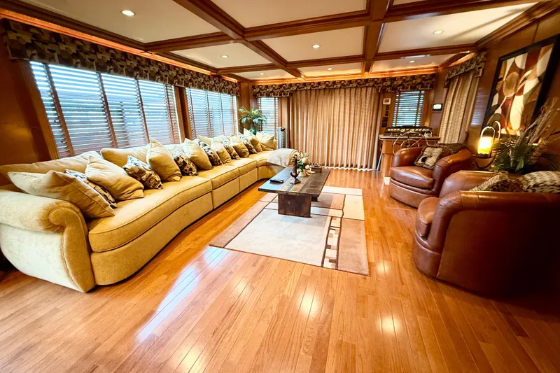 Slide: The Image of Luxurious 2008 Sumerset houseboat interior with elegant seating, wooden flooring, and stylish decor. - 33