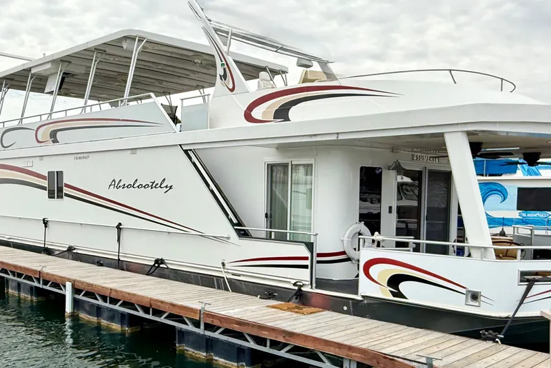 Slide: The Image of 2008 Sumerset Luxury HouseBoat 102' X 19' docked, featuring sleek design and modern amenities. - 5