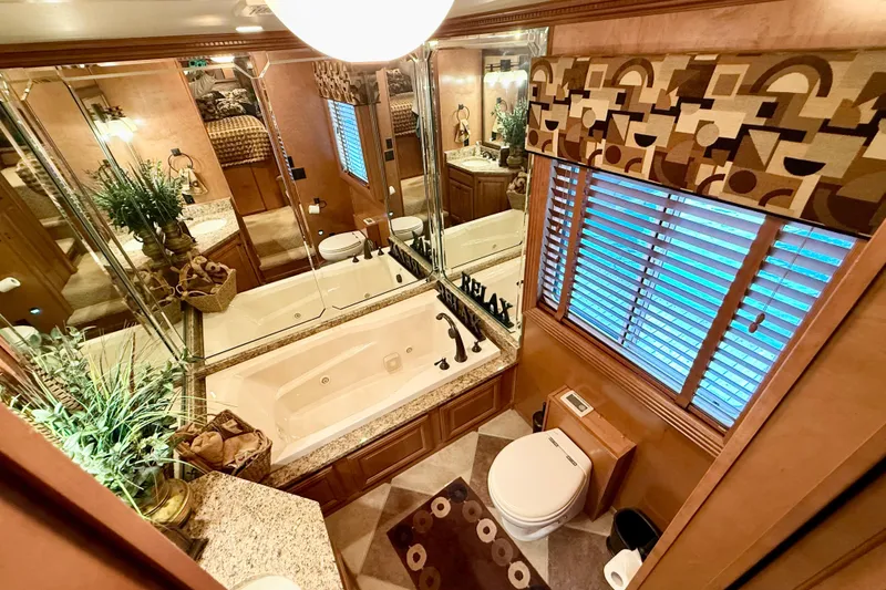 Slide: The Image of Luxurious bathroom in 2008 Sumerset houseboat with jacuzzi, elegant decor, and modern amenities. - 52