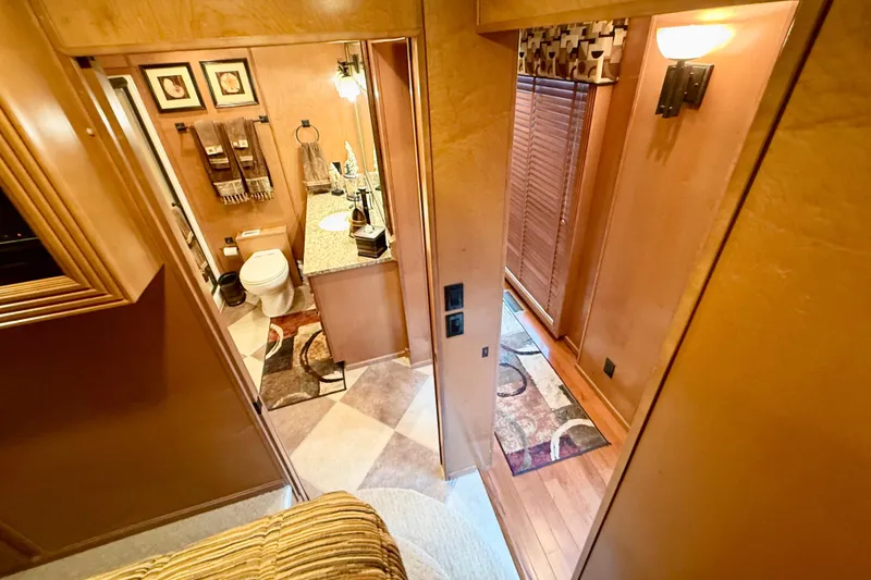 Slide: The Image of Luxurious 2008 Sumerset houseboat interior with elegant bathroom and hallway design. - 58