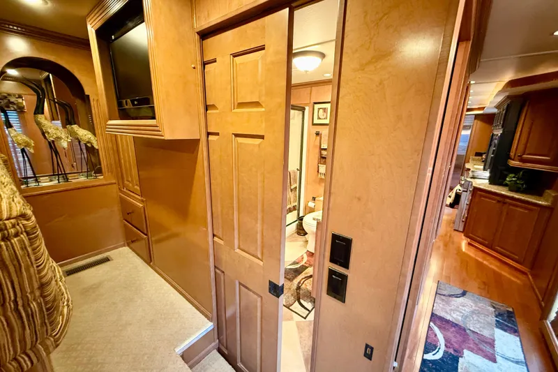 Slide: The Image of Luxurious 2008 Sumerset houseboat interior with wooden cabinetry and modern amenities. - 59