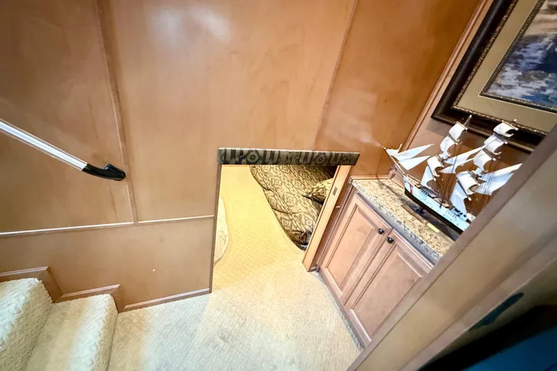 Slide: The Image of Interior of 2008 Sumerset Luxury HouseBoat with model ship and cozy cabin entrance. - 62