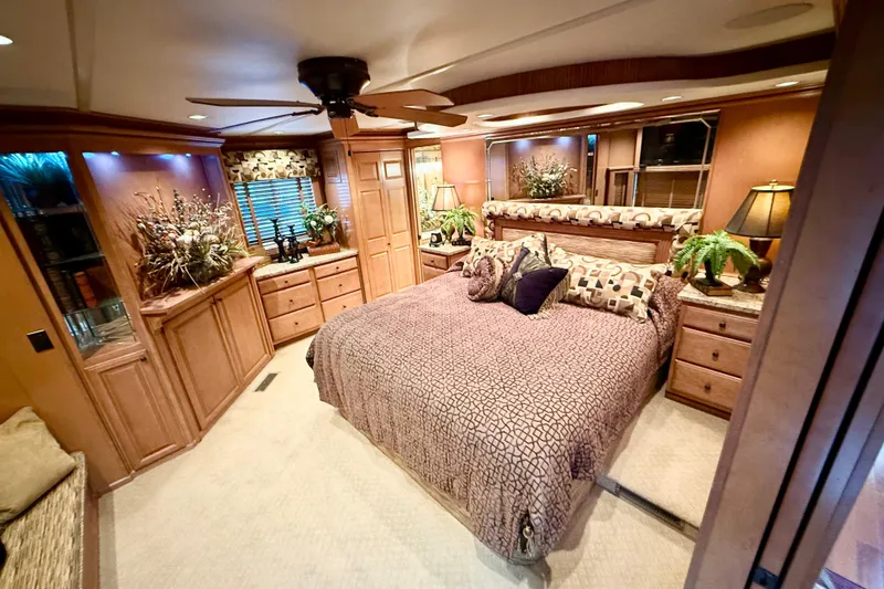 Slide: The Image of Luxurious bedroom interior of 2008 Sumerset HouseBoat, featuring elegant decor and cozy ambiance. - 69
