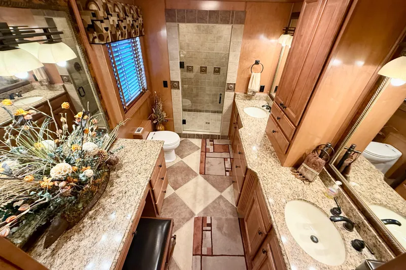 Slide: The Image of Luxurious bathroom in 2008 Sumerset houseboat with granite countertops and elegant decor. - 74