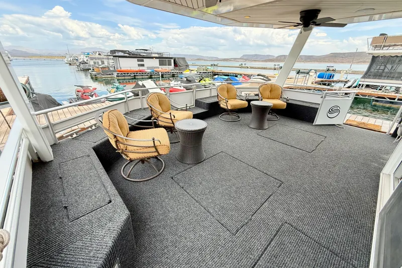 Slide: The Image of Spacious deck of 2008 Sumerset Luxury HouseBoat with seating, overlooking marina. - 8
