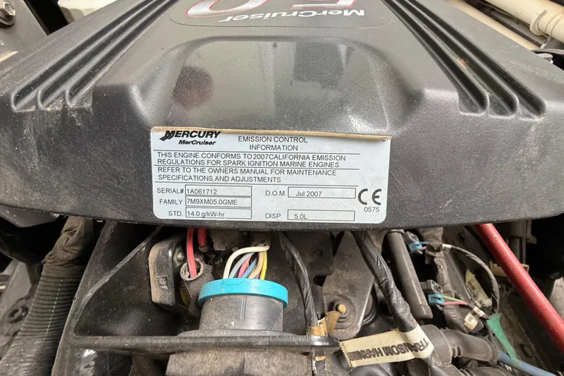 Slide: The Image of Mercury MerCruiser engine label on 2008 Sumerset Luxury HouseBoat, showing emission control details. - 87