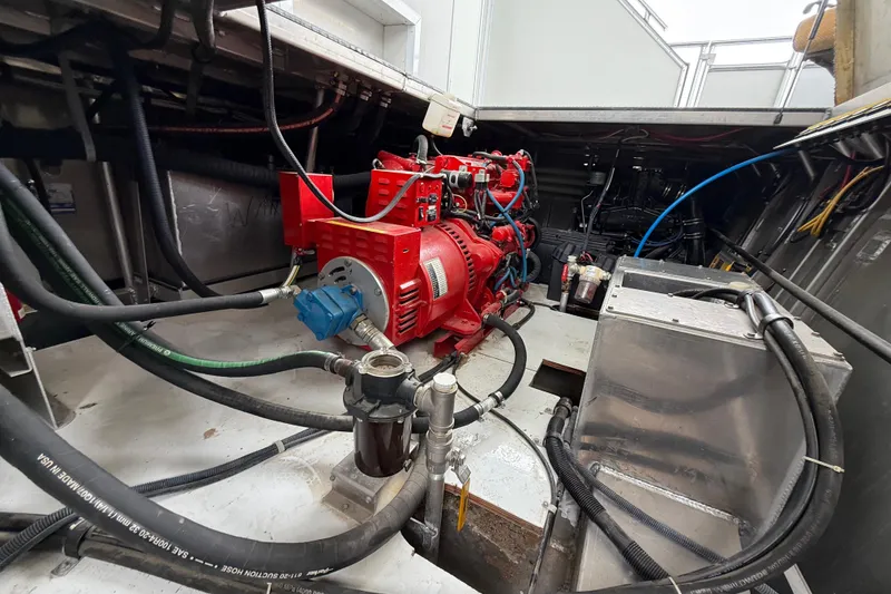 Slide: The Image of Engine room of 2008 Sumerset Luxury HouseBoat, showcasing mechanical components and wiring. - 92