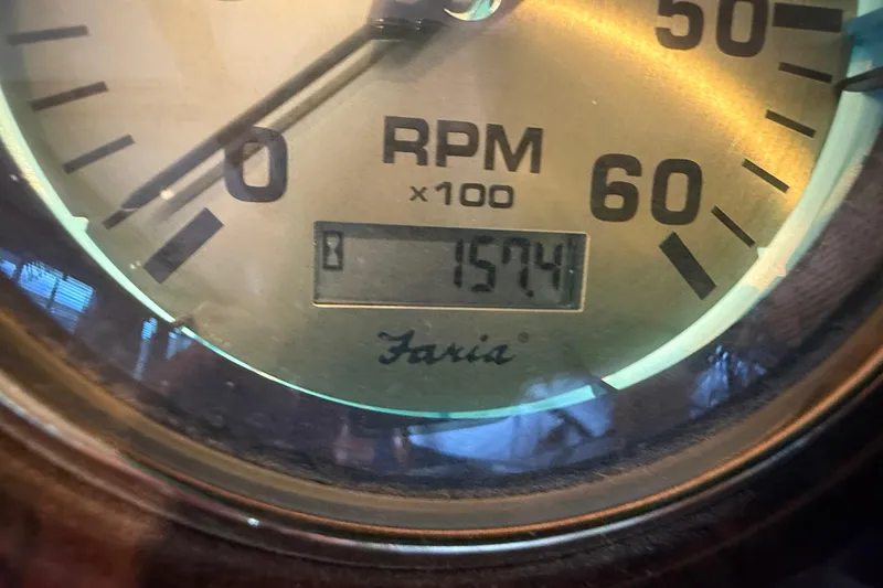 Slide: The Image of Close-up of a Faria RPM gauge on a 2008 Sumerset Luxury HouseBoat. - 99