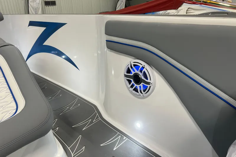 Slide: The Image of 2024 Donzi 39 VRZ boat interior with stylish seating and ambient lighting. - 26