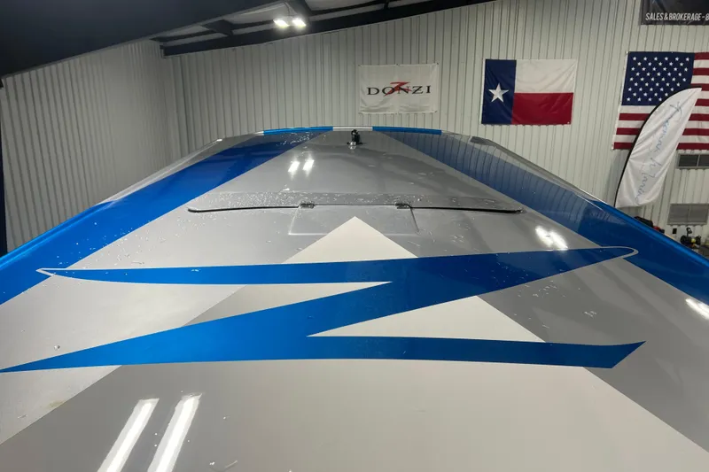 Slide: The Image of 2024 Donzi 39 VRZ boat interior with modern lighting and sleek design. - 32