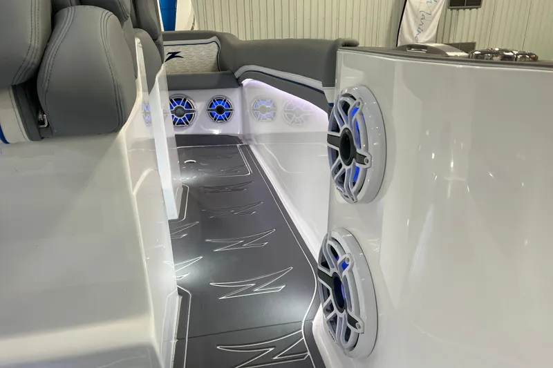 Slide: The Image of 2024 Donzi 39 VRZ boat interior with sleek design and modern features in a workshop setting. - 34