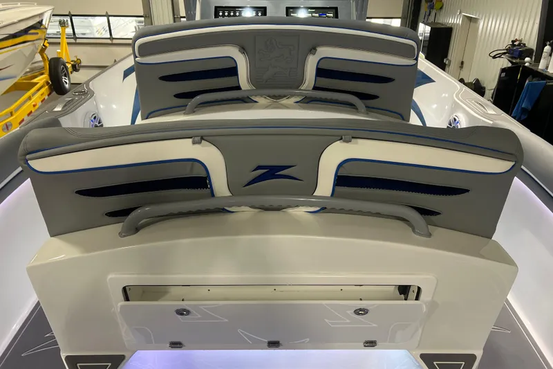 Slide: The Image of 2024 Donzi 39 VRZ boat interior with advanced dashboard and stylish seating. - 45
