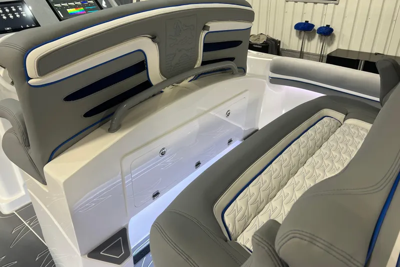 Slide: The Image of 2024 Donzi 39 VRZ boat interior with modern dashboard and seating. - 47