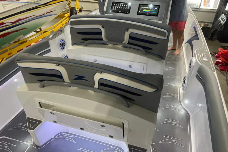 Slide: The Image of 2024 Donzi 39 VRZ boat with triple Mercury outboard engines, top view. - 58