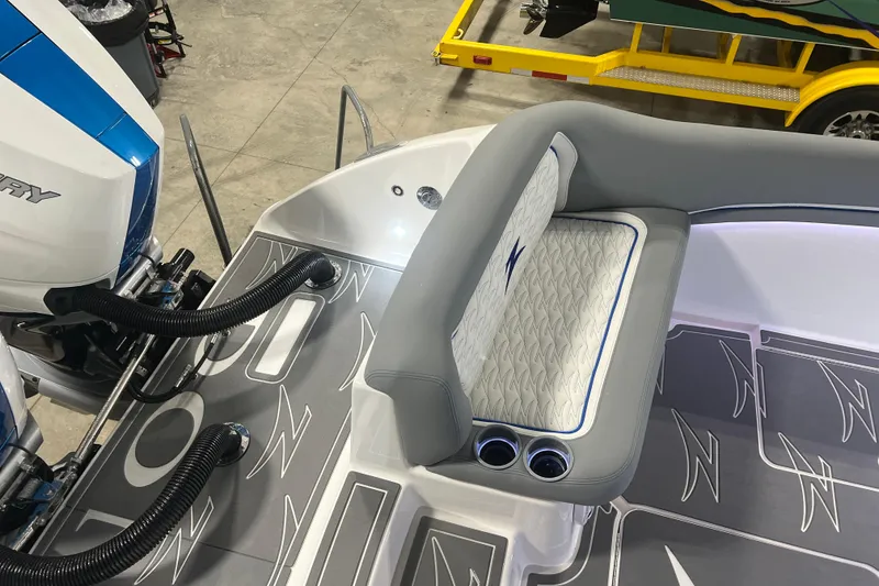 Slide: The Image of 2024 Donzi 39 VRZ boat interior with modern seating and control panel. - 59