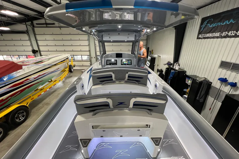 Slide: The Image of 2024 Donzi 39 VRZ boat interior with stylish seating and modern design elements. - 60