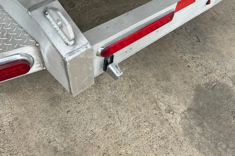 Slide: The Image of Trailer hitch detail for 2024 Donzi 39 VRZ boat on concrete surface. - 73