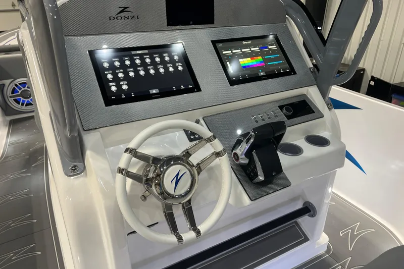 Slide: The Image of 2024 Donzi 39 VRZ boat model name in blue lettering on white surface. - 9