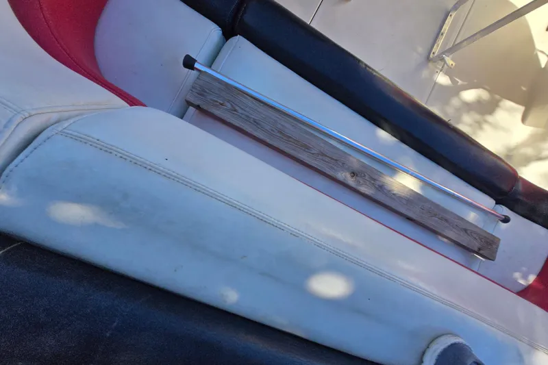 Slide: The Image of Close-up of a weathered boat propeller on gravel, featuring "Mirage" branding. - 14