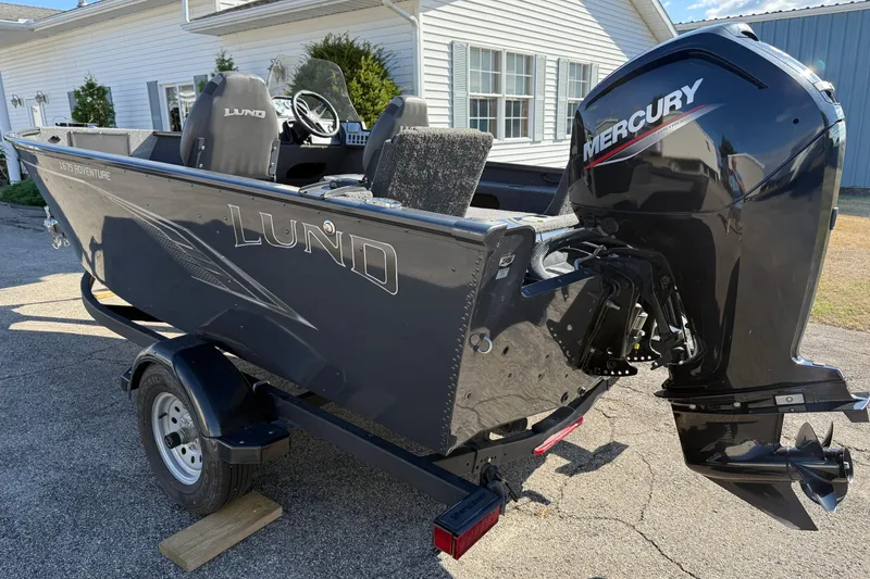 Slide: The Image of 2021 Lund 1675 Adventure Sport boat with Mercury outboard motor on trailer. - 3