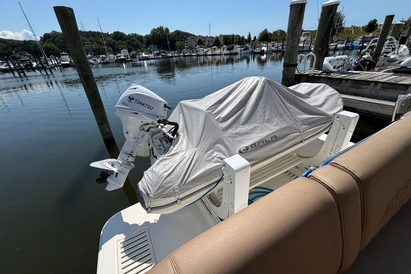Slide: The Image of 2018 Sea Ray Sundancer 460 with covered Gala boat and Tohatsu motor at marina. - 6