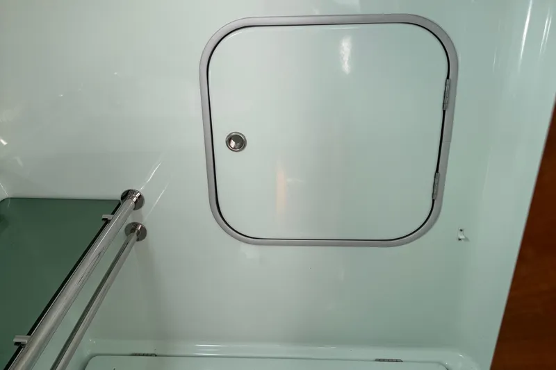 Slide: The Image of Interior hatch of 1994 Beneteau First 35s-7 sailboat, featuring sleek design and metal railing. - 16