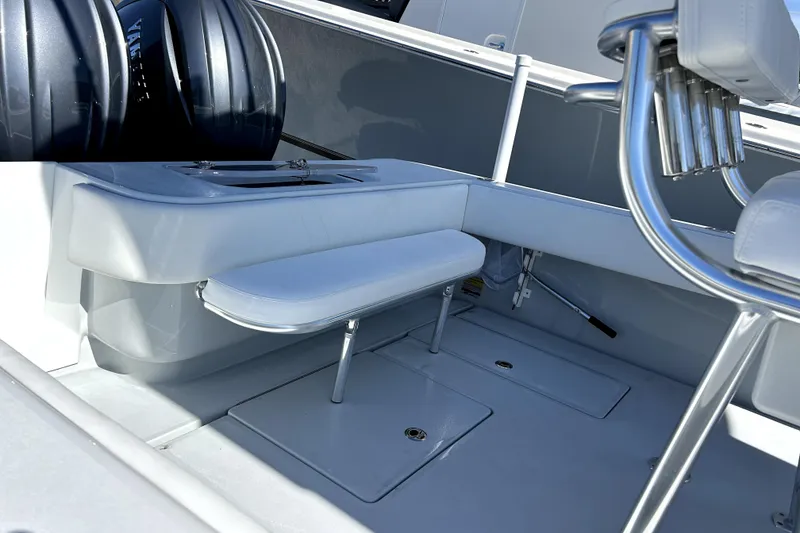 Slide: The Image of 2025 Contender 25 Tournament boat interior with seating and rod holders. - 14