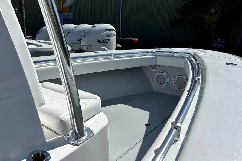 Slide: The Image of 2025 Contender 25 Tournament boat interior with seating and Yamaha XTO engines. - 6