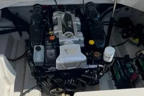 Slide: The Image of 2008 Sea Ray 290 Sundeck engine compartment with visible components and wiring. - 6