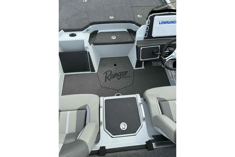 Slide: The Image of 2026 Ranger Z521 boat interior with seating, console, and Lowrance electronics. - 14
