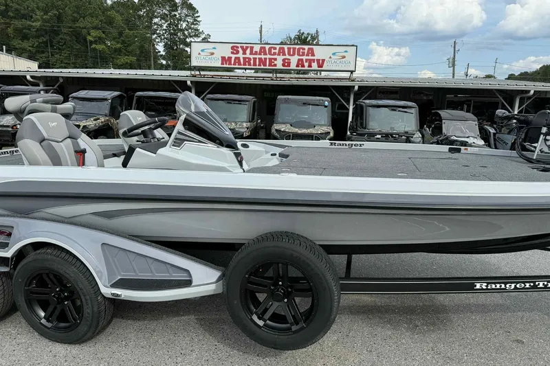 Slide: The Image of 2026 Ranger Z521 boat at Sylacauga Marine & ATV dealership, featuring sleek design and modern features. - 2