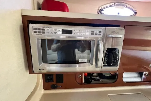 Slide: The Image of Microwave and coffee maker in 2008 Sea Ray 340 Sundancer yacht kitchen. - 15