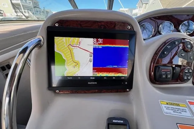 Slide: The Image of Dashboard of 2008 Sea Ray 340 Sundancer with Garmin navigation display. - 4