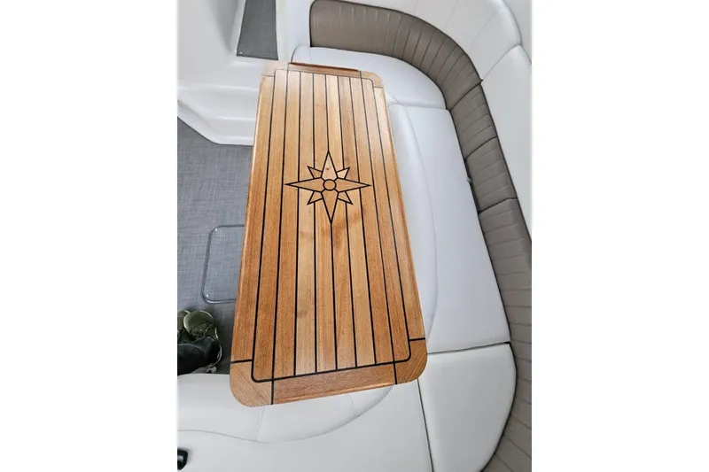 Slide: The Image of Teak table with compass design on 2004 Four Winns 378 Vista boat interior. - 20