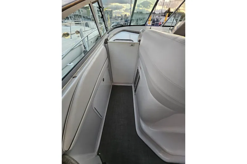 Slide: The Image of 2004 Four Winns 378 Vista boat interior with sleek white seating and modern design. - 22