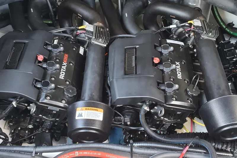 Slide: The Image of Twin Rotax 300 engines in 2024 Scarab 285 Wake ID boat. - 15