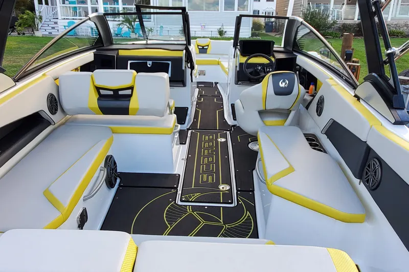 Slide: The Image of 2024 Scarab 285 Wake ID boat interior with modern seating and sleek design. - 27