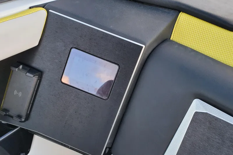 Slide: The Image of 2024 Scarab 285 Wake ID dashboard with touchscreen and wireless charging pad. - 3