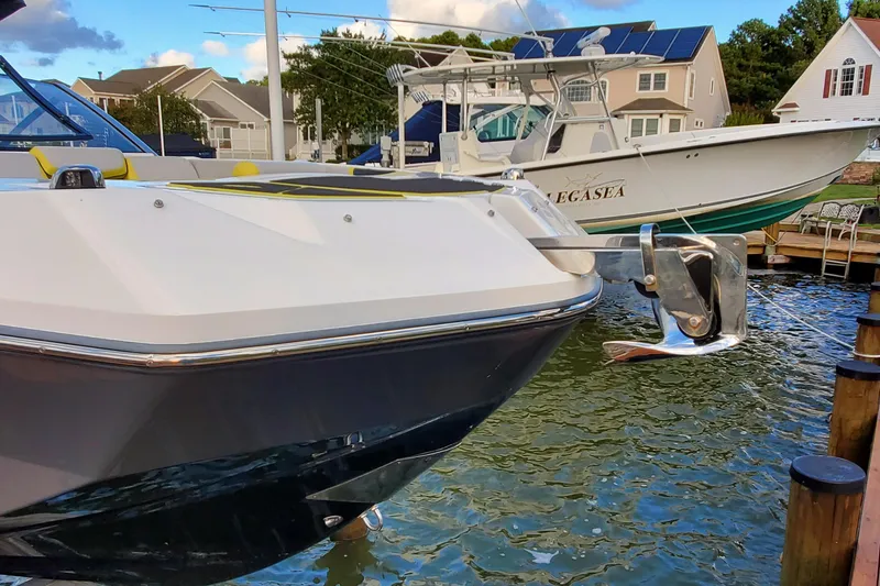 Slide: The Image of 2024 Scarab 285 Wake ID boat docked, featuring sleek design and modern amenities. - 34