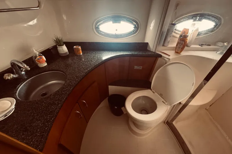 Slide: The Image of Bathroom interior of 2005 Carver 466 Motor Yacht with sink and toilet. - 11