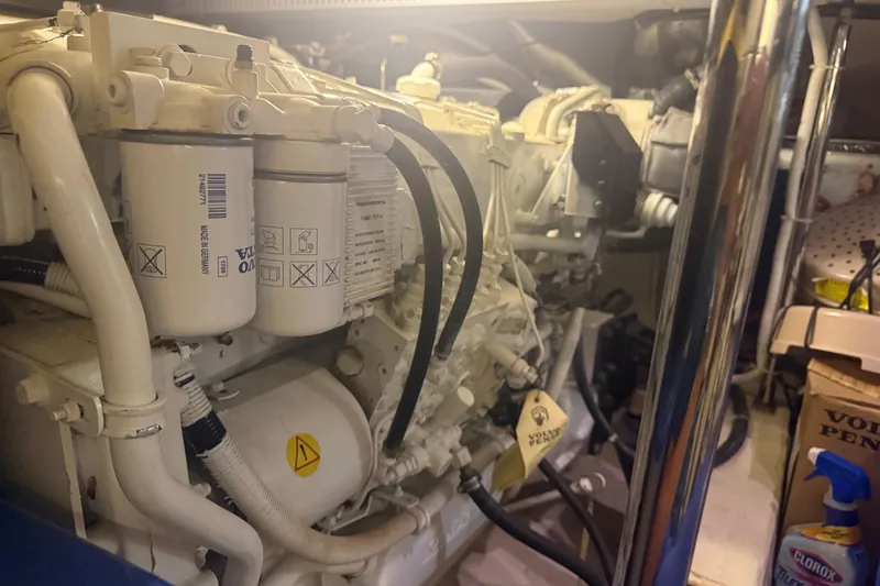 Slide: The Image of Engine room of a 2005 Carver 466 Motor Yacht, featuring Volvo Penta components. - 25