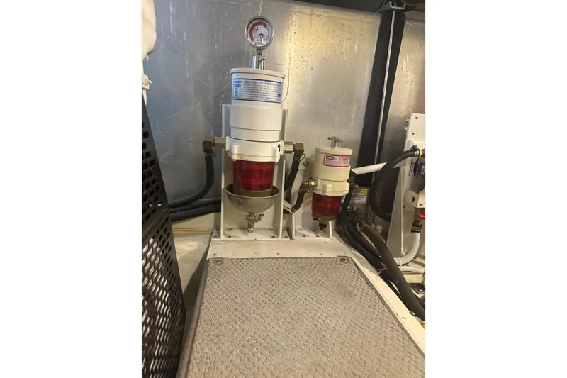 Slide: The Image of Engine room of 2005 Carver 466 Motor Yacht with fuel filtration system. - 27
