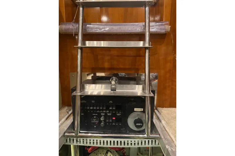 Slide: The Image of Control panel and ladder inside 2005 Carver 466 Motor Yacht. - 34