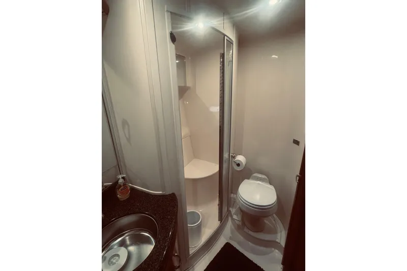 Slide: The Image of Bathroom interior of 2005 Carver 466 Motor Yacht with shower and toilet. - 39