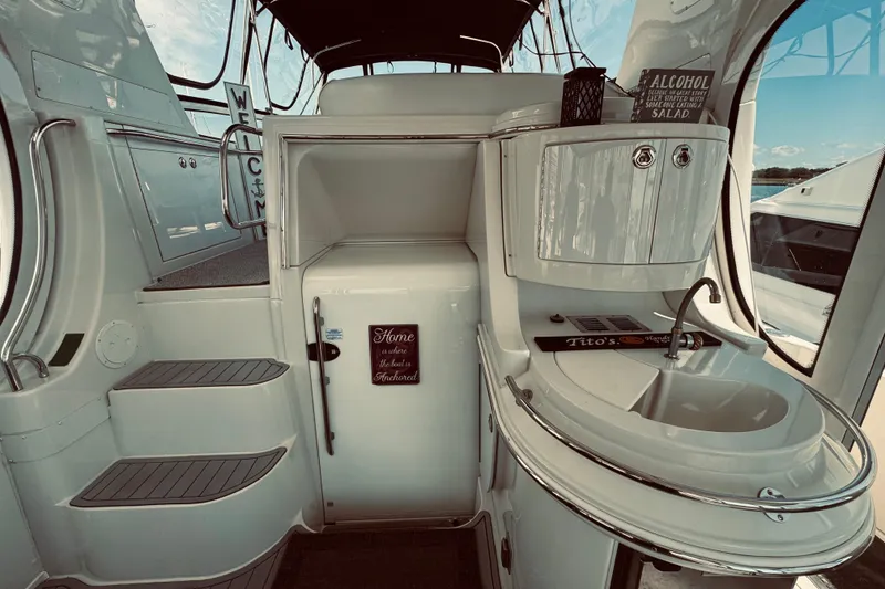 Slide: The Image of 2005 Carver 466 Motor Yacht interior with sink, steps, and nautical decor. - 6