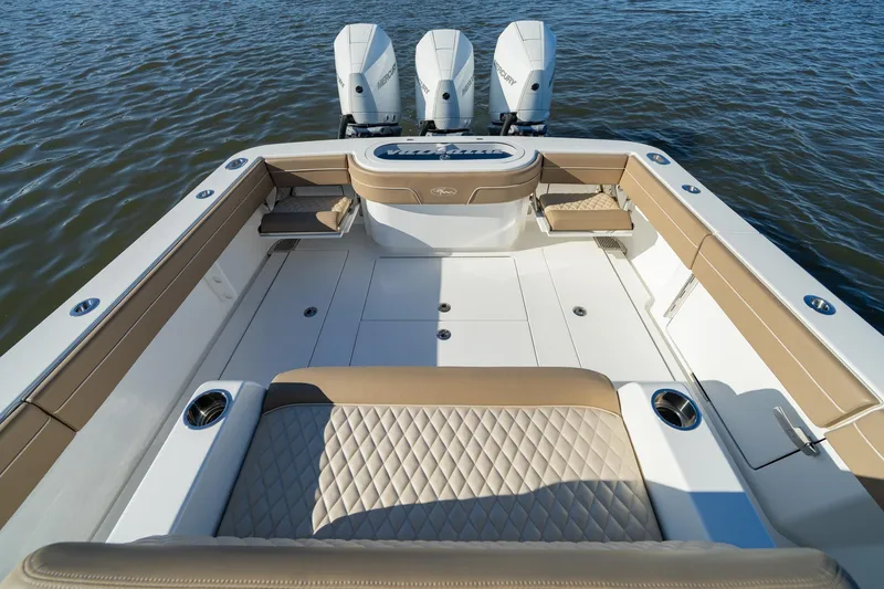 Slide: The Image of 2023 Valhalla Boatworks V-37, spacious deck with luxurious seating, on calm water. - 19