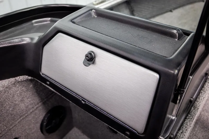 Slide: The Image of 2026 Lund 2075 Impact XS boat interior storage compartment with lock. - 47