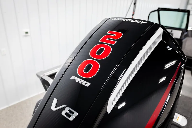 Slide: The Image of 2026 Lund 2075 Impact XS with Mercury 200 Pro V8 engine detail. - 51