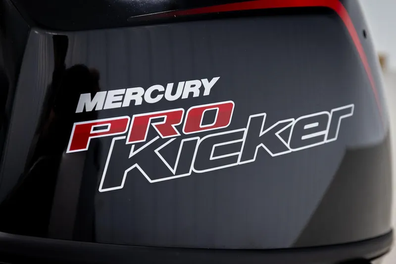 Slide: The Image of Mercury Pro Kicker engine on 2026 Lund 2075 Impact XS boat. - 54